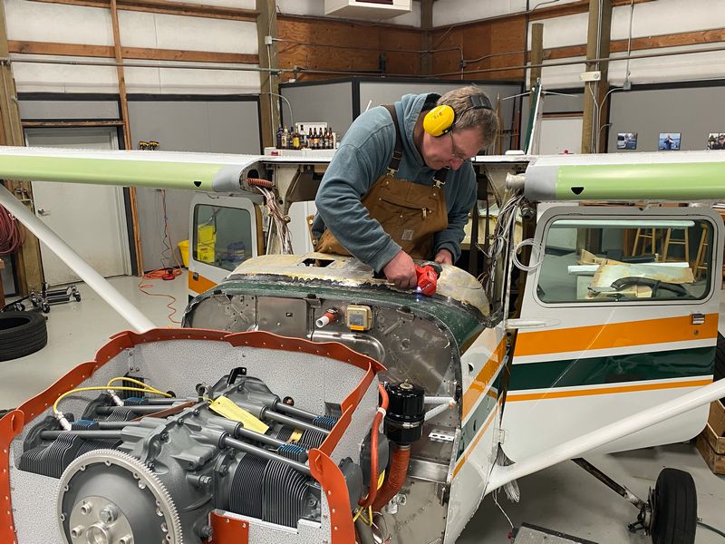 Mechanic working on a Cessna 172 panel upgrade