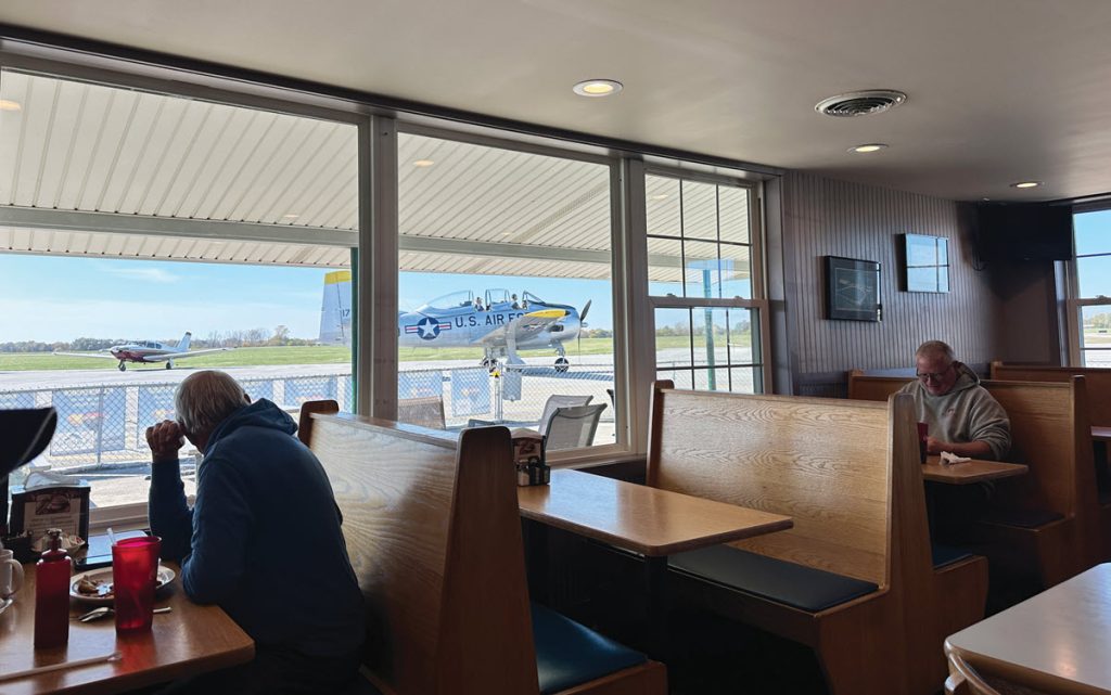 interior of cafe with view of airport