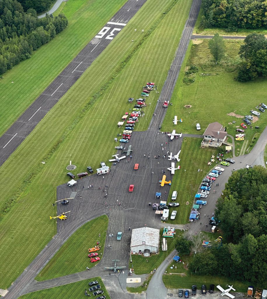 arial view of airport with runways and planes